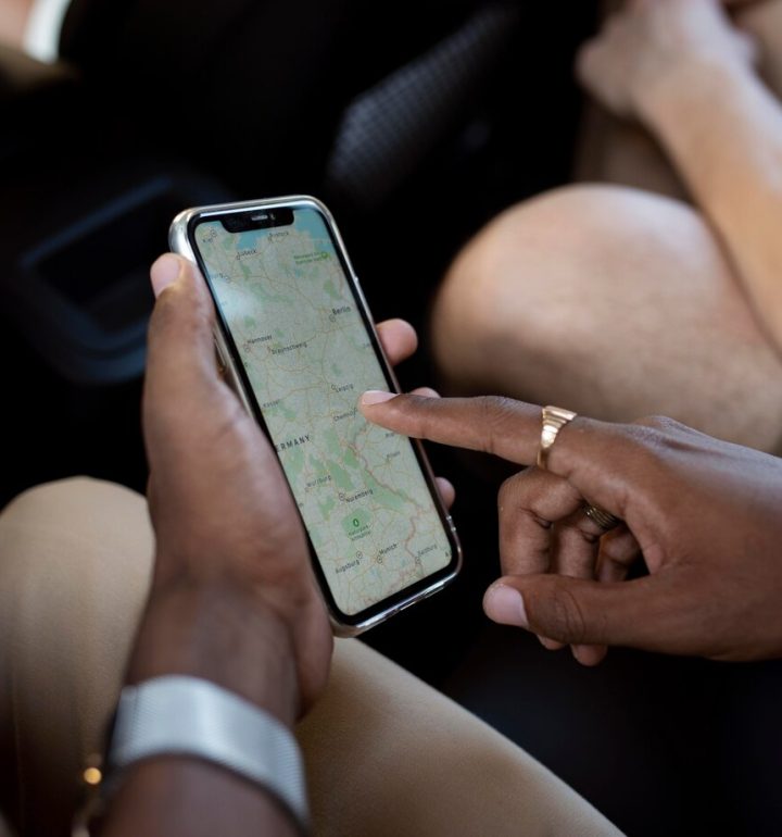close-up-hand-holding-smartphone_23-2149137130